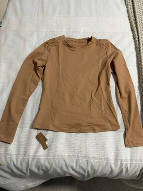 Skims Long Sleeve Swim Top in Ochre
